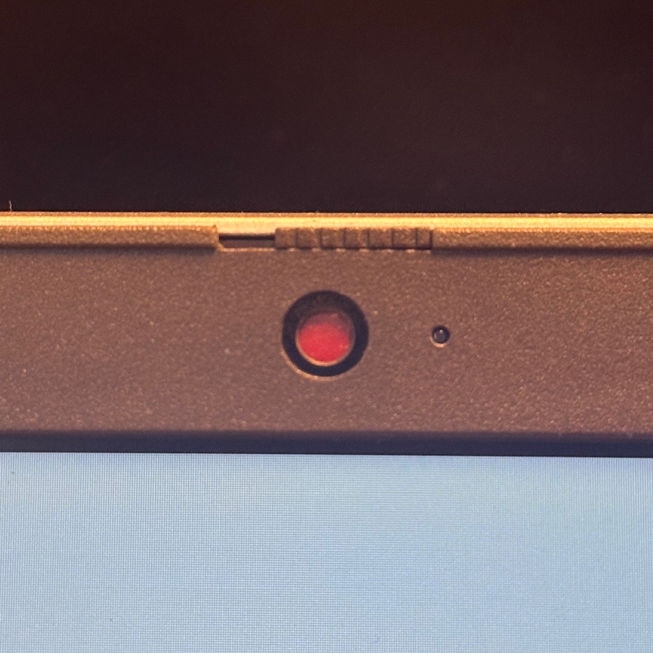 Laptop webcam with the cover switch closed, covering the camera